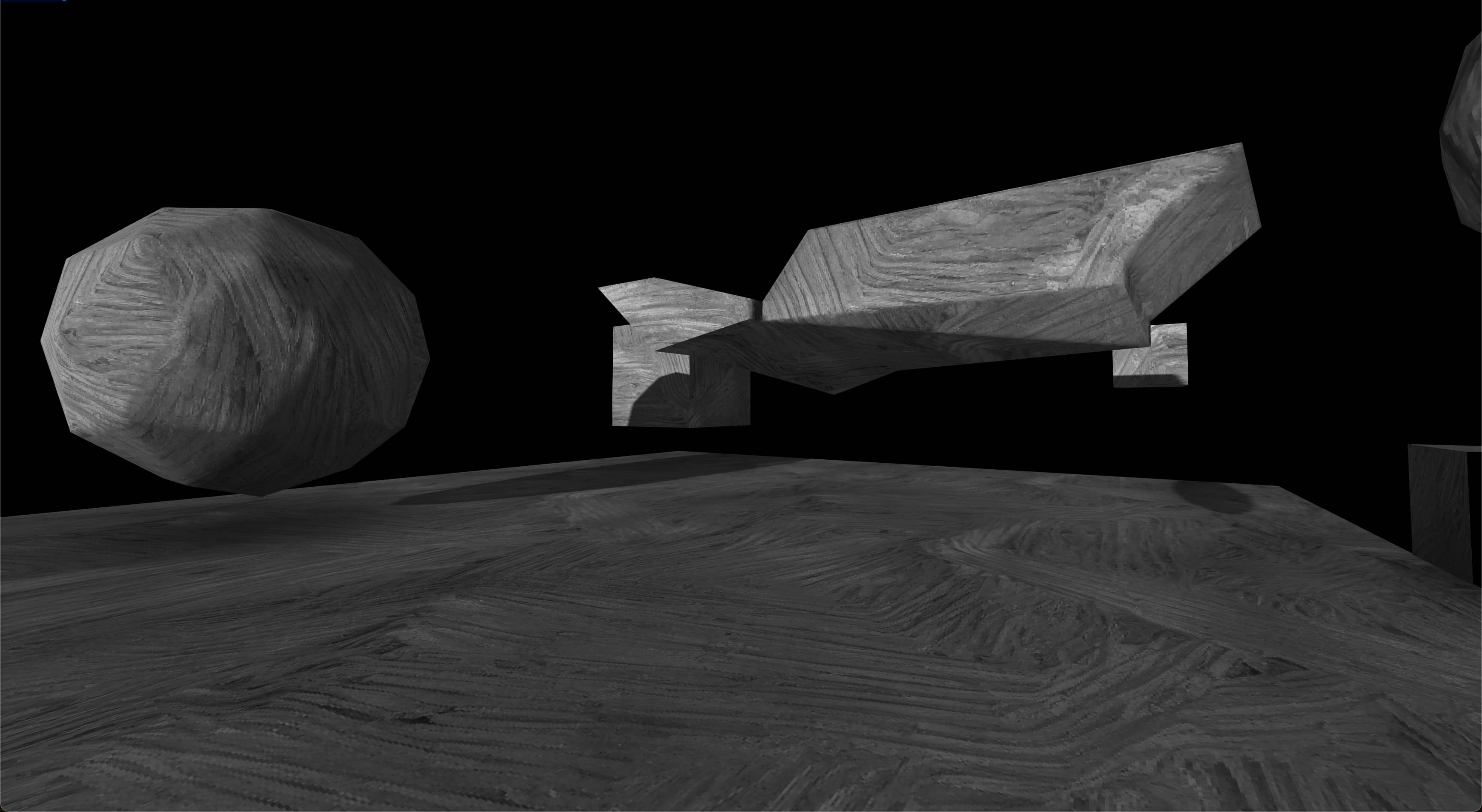 A screenshot of a scene rendered with Three.JS.  There are several floating geometric forms above a rectangular platform.  They're composed of simple shapes with sharp angles. All the shapes and the platform are shaded with a dark gray rock or cement-like color.  There are some shadows visible cast from a light source off screen. The background is pure black.